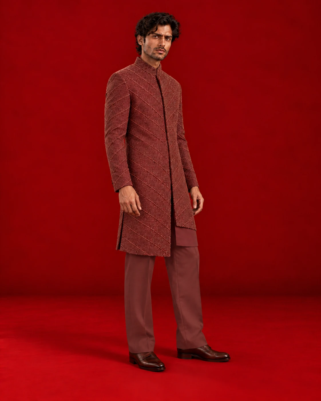 Wine-toned Indo-Western ensemble with an all-over textured pattern