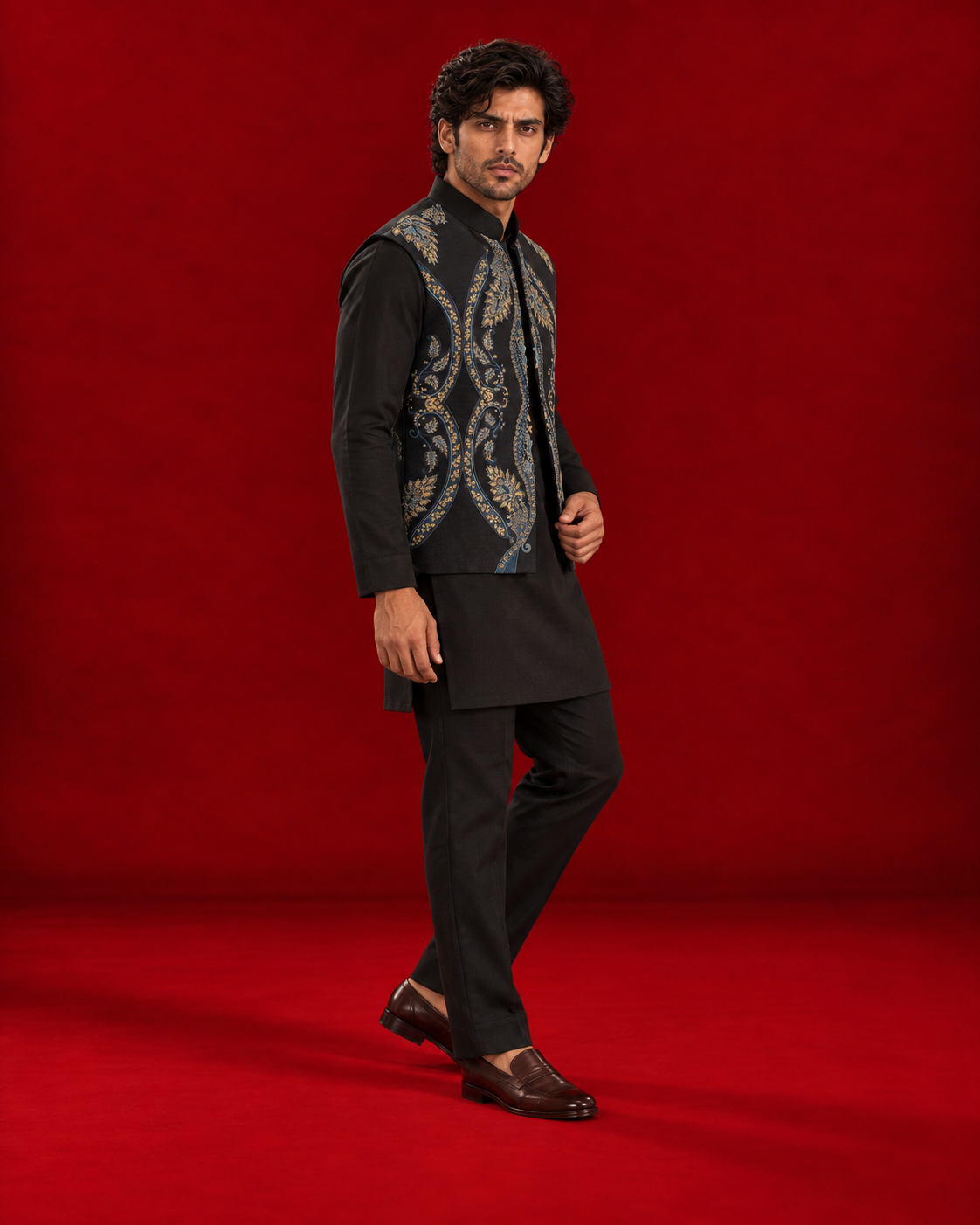 Black kurta ensemble with blue and gold bandi